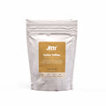 Jittr Coffee Co Swiss Toffee flavored coffee in a 250g bag with rich toffee swirls and coffee beans.