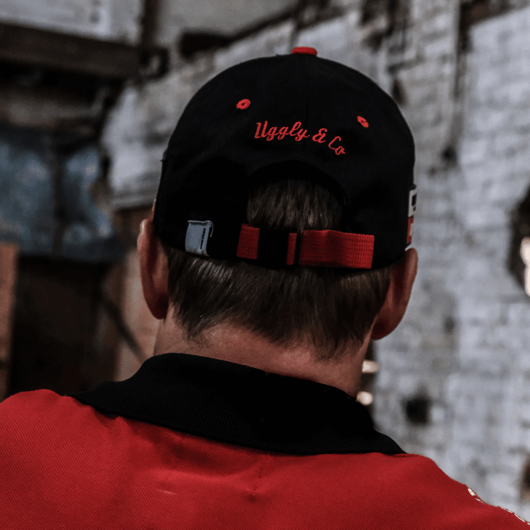 Milwaukee Tools x Ducati team-wear trucker hat with racing branding, featuring a structured baseball cap design and adjustable strap.