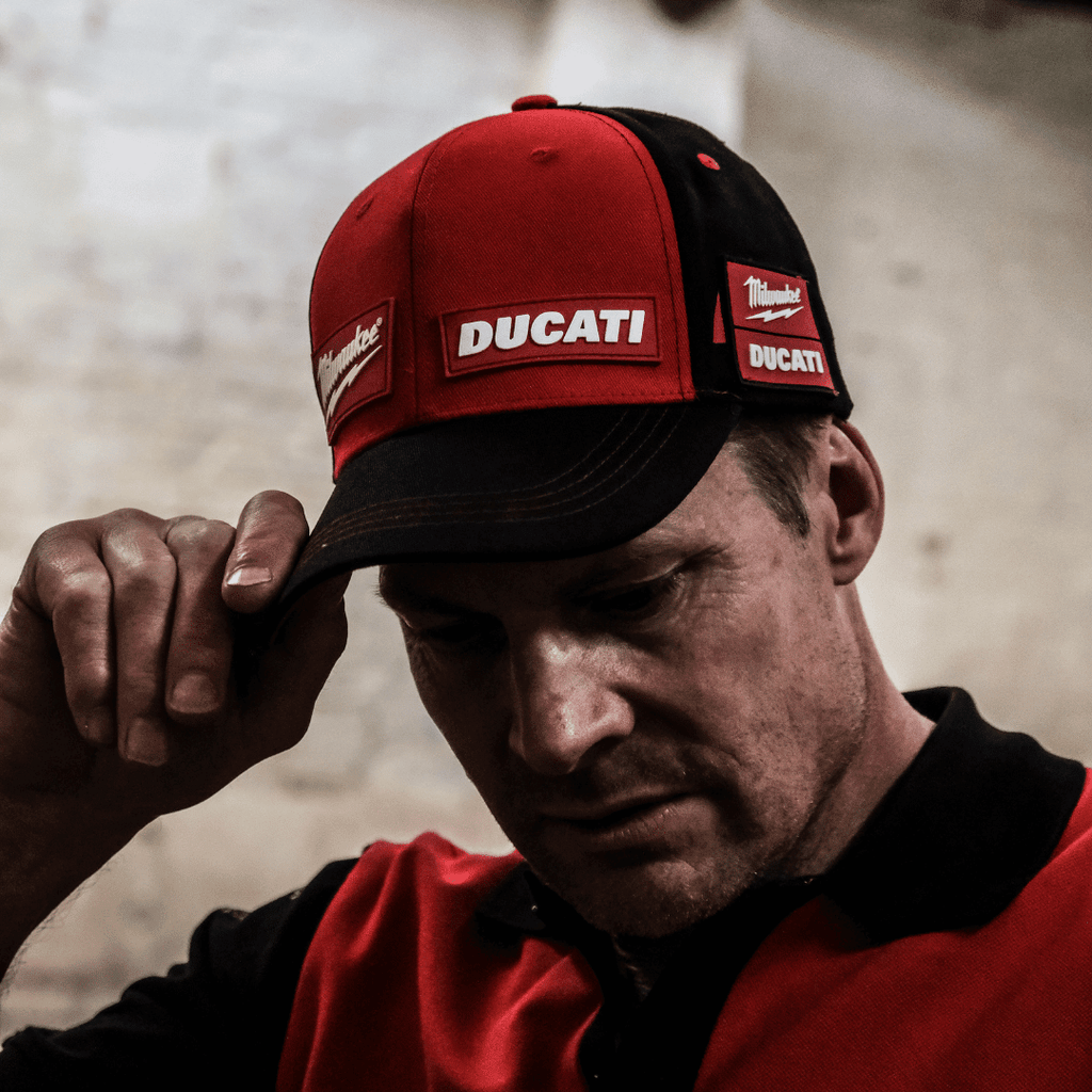 Milwaukee Tools x Ducati team-wear trucker hat featuring racing graphics and branding, casual baseball cap style.