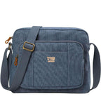 Large black canvas crossbody bag by Troop London with adjustable strap and stone-washed finish, designed for everyday use.