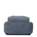 Small charcoal canvas backpack by Troop London with a tablet sleeve and adjustable straps.