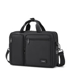 Black Troop London business laptop bag briefcase with padded compartments and sturdy handles for professional use.