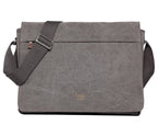 Charcoal canvas Troop London large 18-inch messenger bag with adjustable strap and multiple compartments for laptops and essentials.