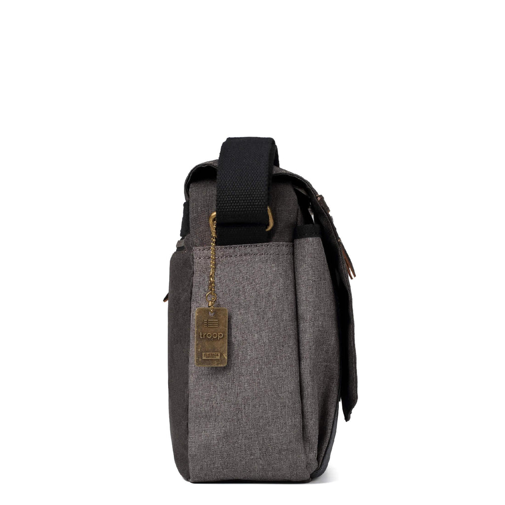 Grey Urban Canvas Messenger Bag by Troop London with adjustable strap and multiple compartments for everyday use.