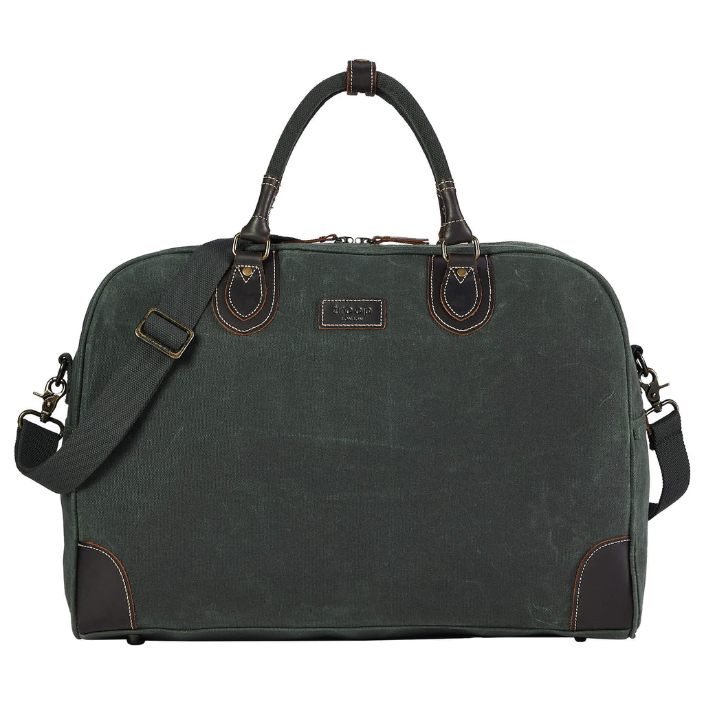 Large charcoal canvas travel holdall by Troop London, 45L size, durable luggage bag with sturdy handles and spacious interior.
