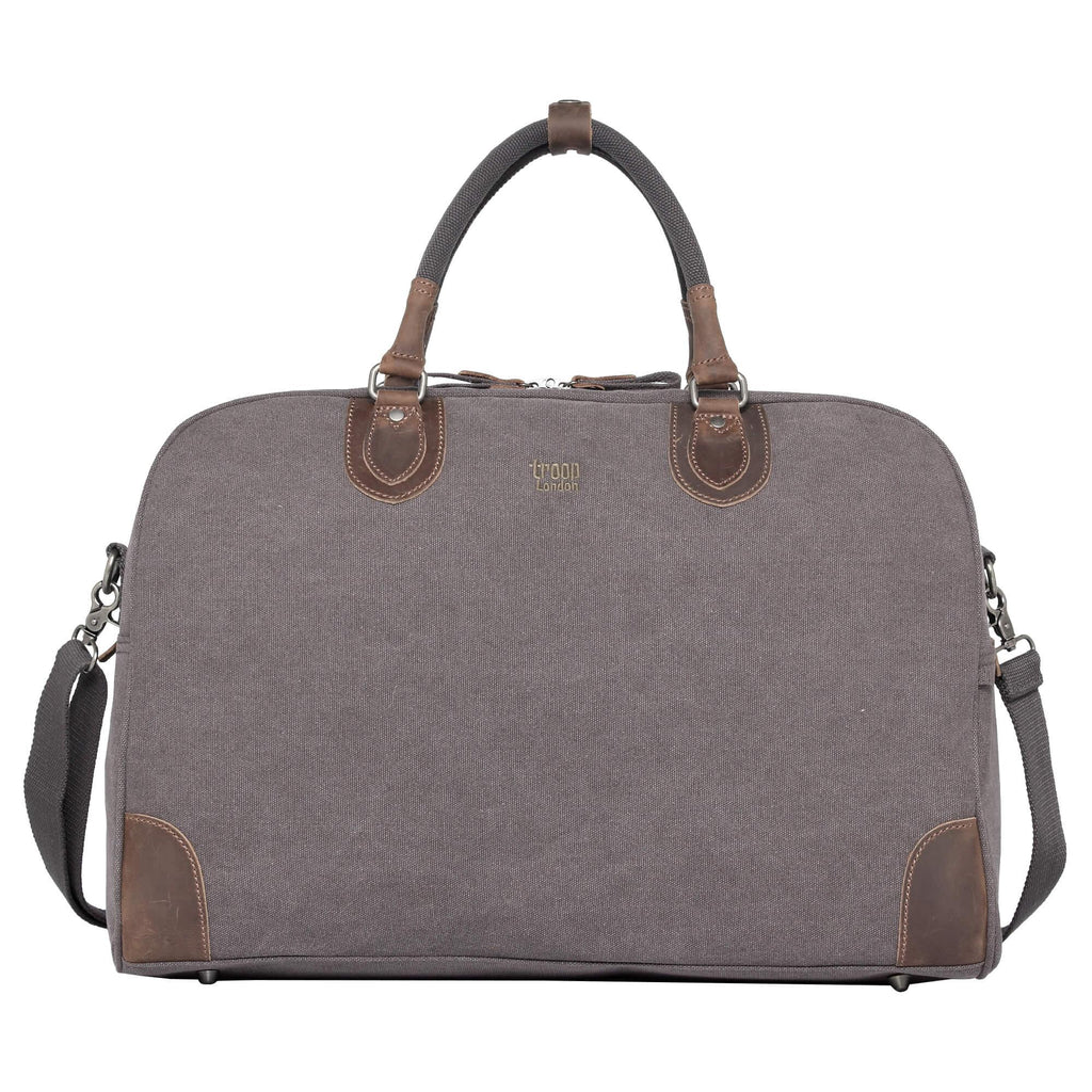 Large charcoal canvas travel holdall by Troop London, 45L luggage bag with sturdy handles and spacious interior for travel.