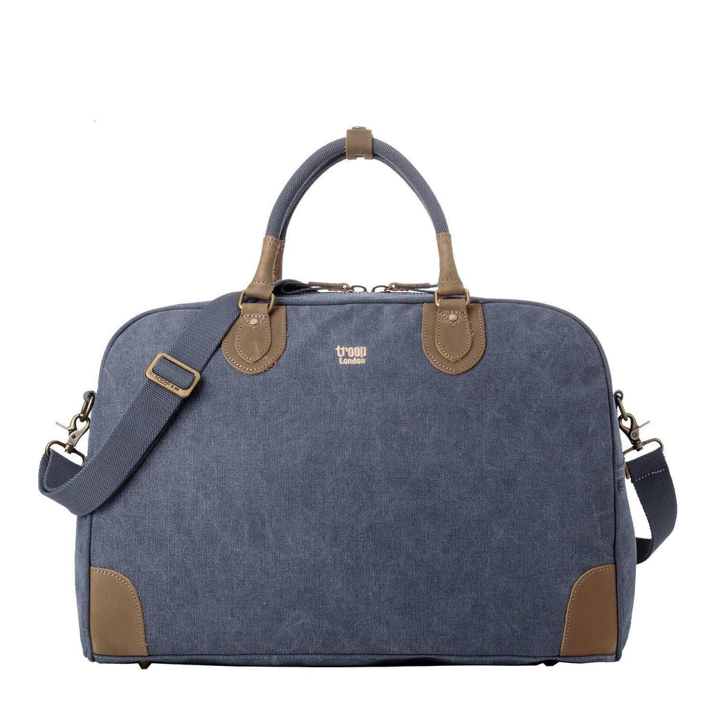 Large charcoal canvas travel holdall by Troop London, 45L luggage bag with sturdy handles and spacious interior.