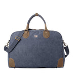 Large charcoal canvas travel holdall by Troop London, 45L luggage bag with sturdy handles and spacious interior.