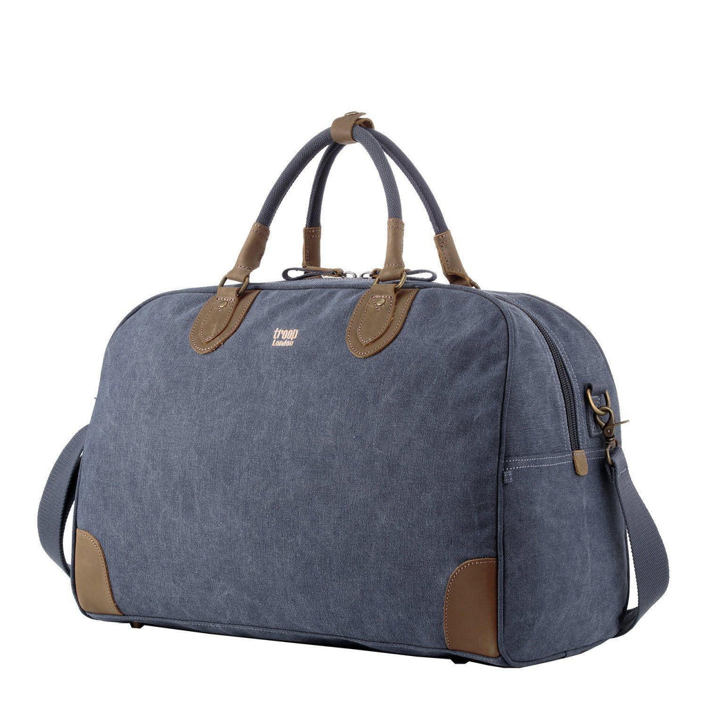 Large charcoal canvas travel holdall bag by Troop London, 45L luggage with sturdy handles and spacious interior for travel.