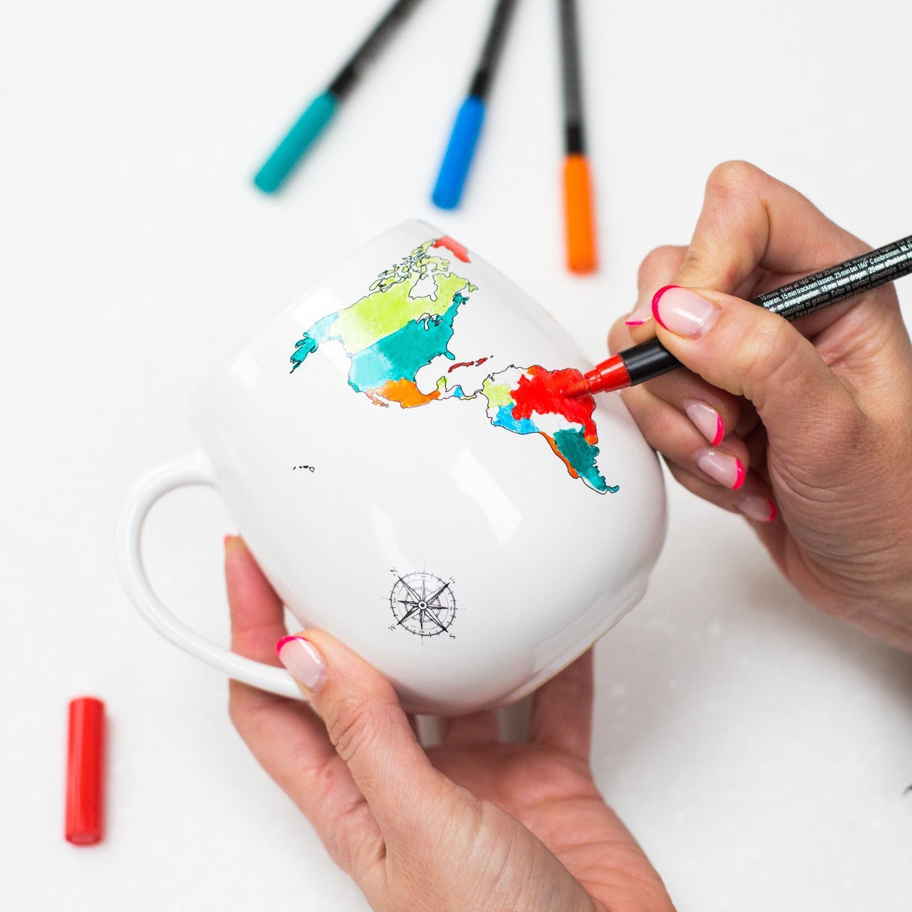 Set of four Trouvaille ceramic pens with colorful ink, ideal for coloring or decorating ceramic mugs and other surfaces.