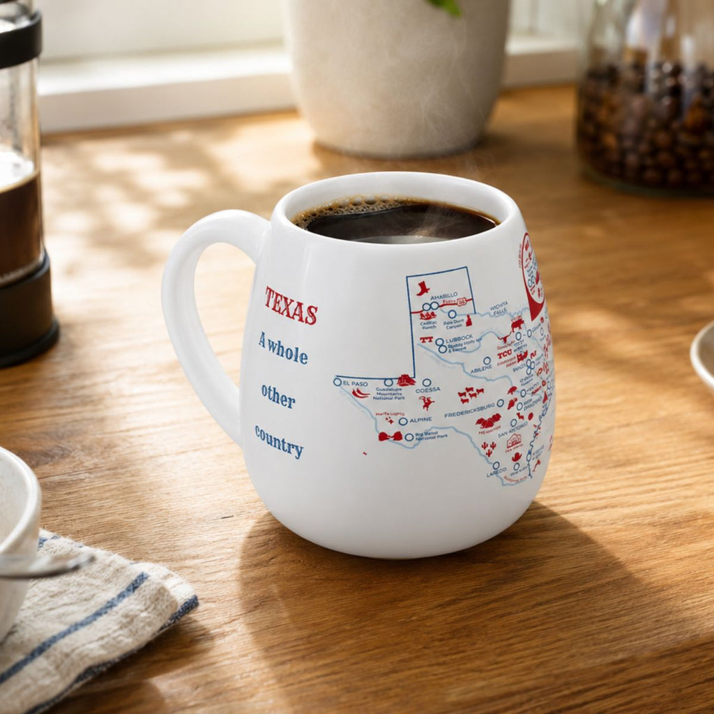 Color-in Texas map travel mug by Trouvaille, featuring a vibrant outline design on a ceramic mug for creative coloring.