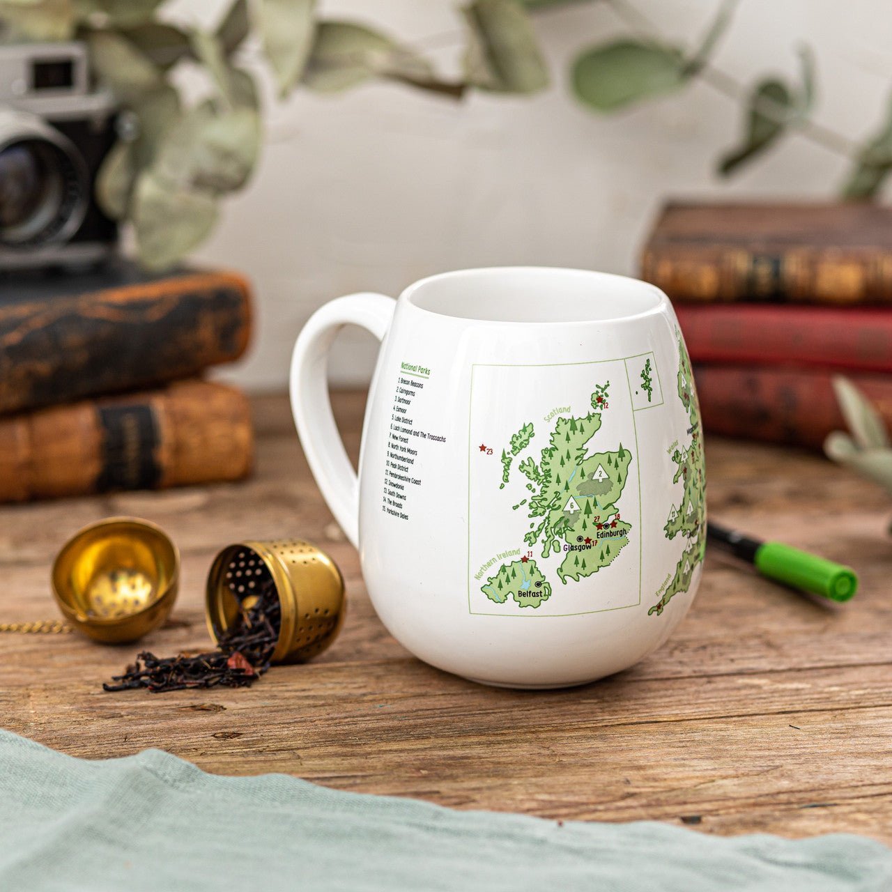 Trouvaille UK Explorer Colour-In Mug featuring a map of national parks and heritage sites, perfect for coloring and travel enthusiasts.