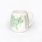 Trouvaille US Golf Courses color-in mug featuring a detailed golf course design ready to be colored in.