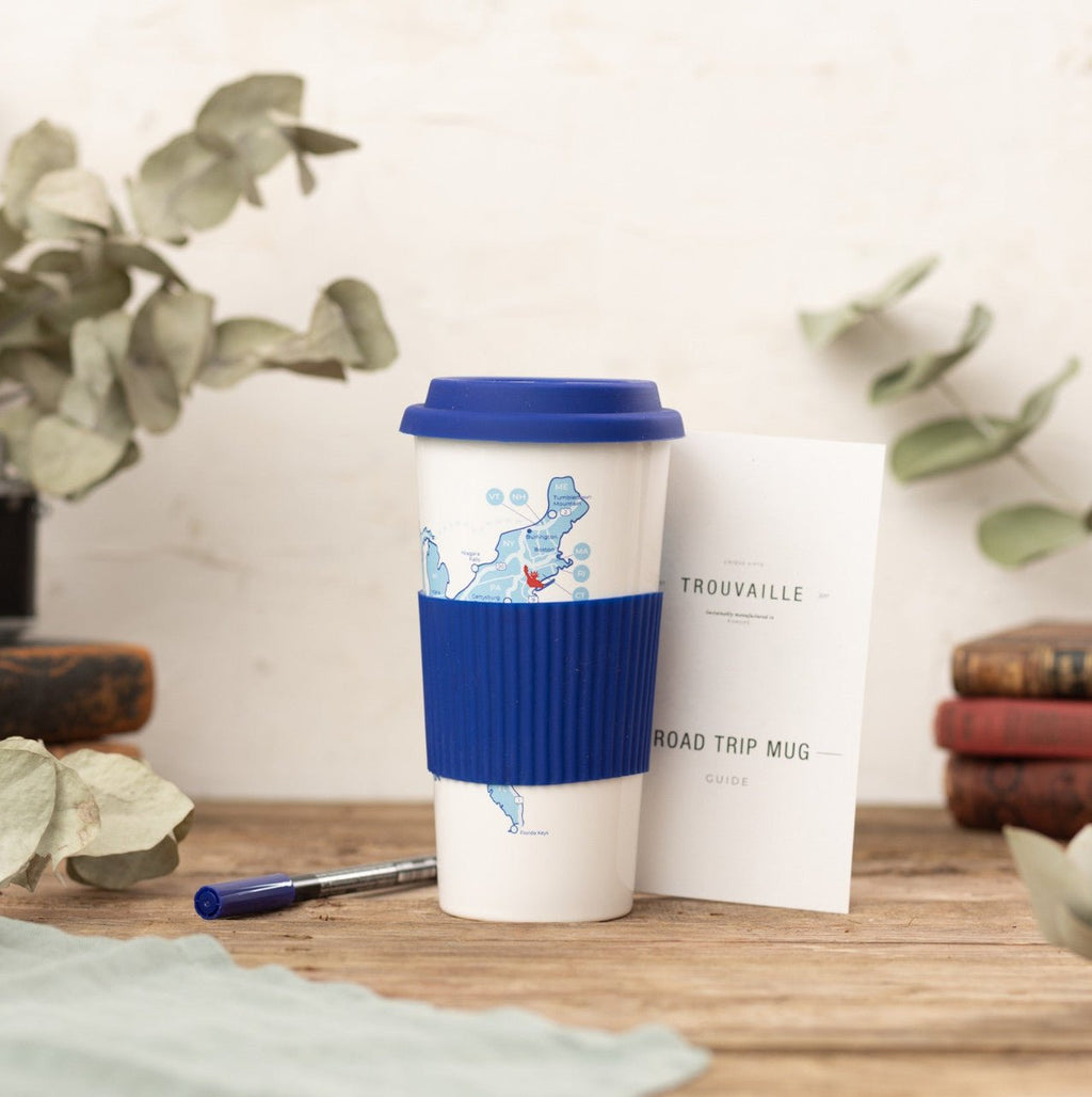 Trouvaille US Road Trip Map color-in travel mug featuring a detailed map design on a ceramic cup.