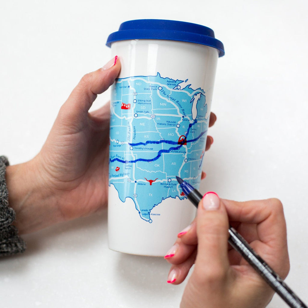 Trouvaille US Road Trip Map color-in travel mug with a blank map design for coloring, made of ceramic with a travel cup shape.
