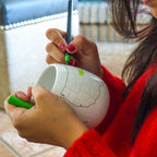 Trouvaille USA map color-in travel mug with a white background and colorful outline of the United States for coloring fun.