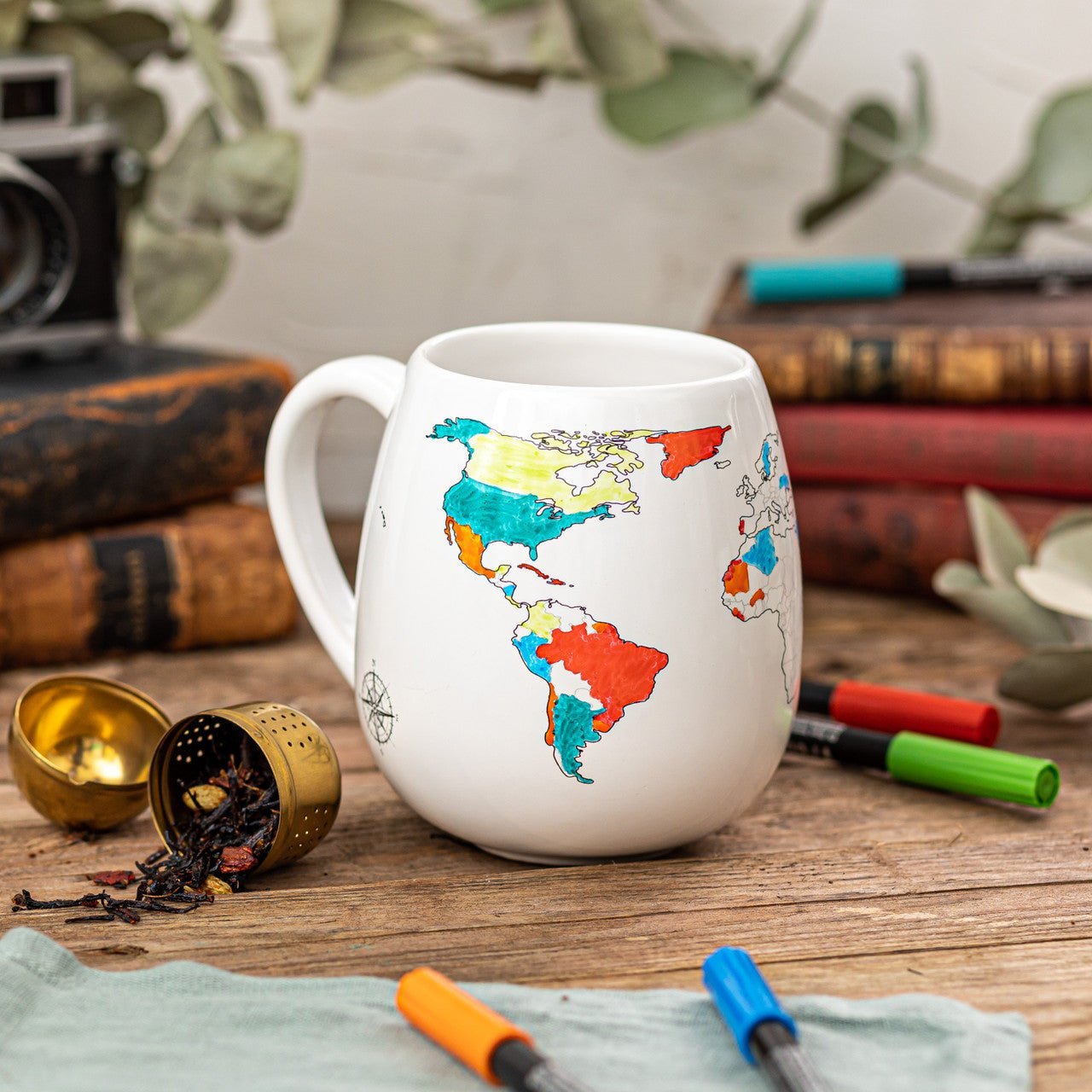 Trouvaille World Map Colour-In Mug featuring a world map design, perfect for travel enthusiasts and adventurers.