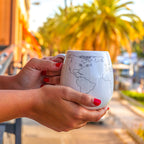 Trouvaille world map colour-in mug with travel-themed design, perfect for adventurers and travel gift enthusiasts.