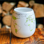 Trouvaille world map color-in mug featuring a detailed world map design, perfect for travel enthusiasts and adventurers.