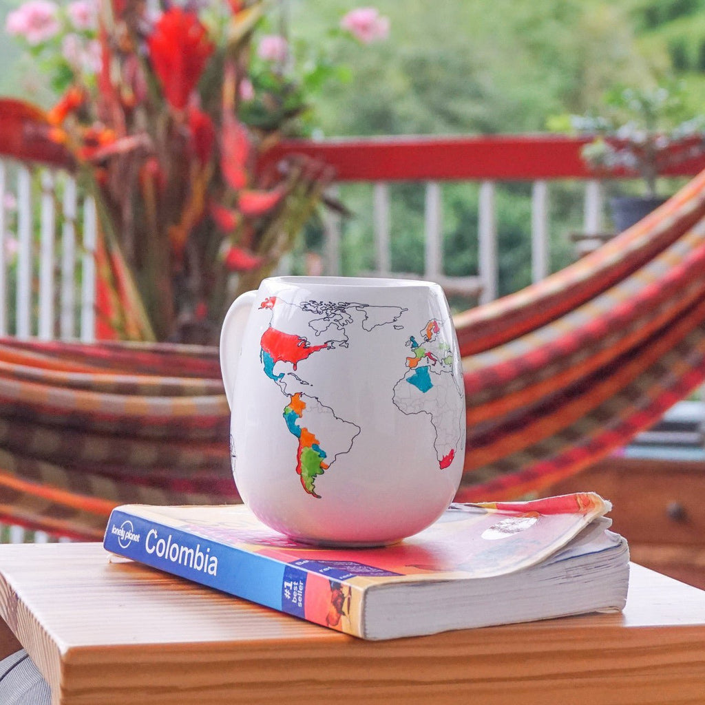 Trouvaille World Map Colour-In Mug featuring a detailed map design, ideal for travel enthusiasts and adventurers.