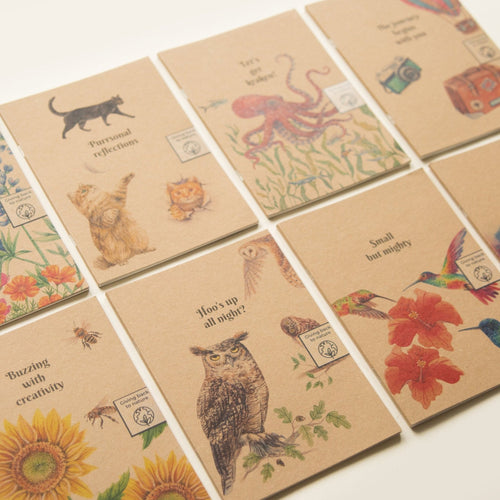 Trouvaille recycled paper notebook with illustrated cover, eco-friendly journal for writing and note-taking.