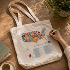 Cotton tote bag with US Book Lover color-in design by Trouvaille, featuring sturdy handles and spacious interior for carrying books.