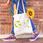 Colorful USA map design on Trouvaille travel tote bag with sturdy handles, perfect for travelers and everyday use.