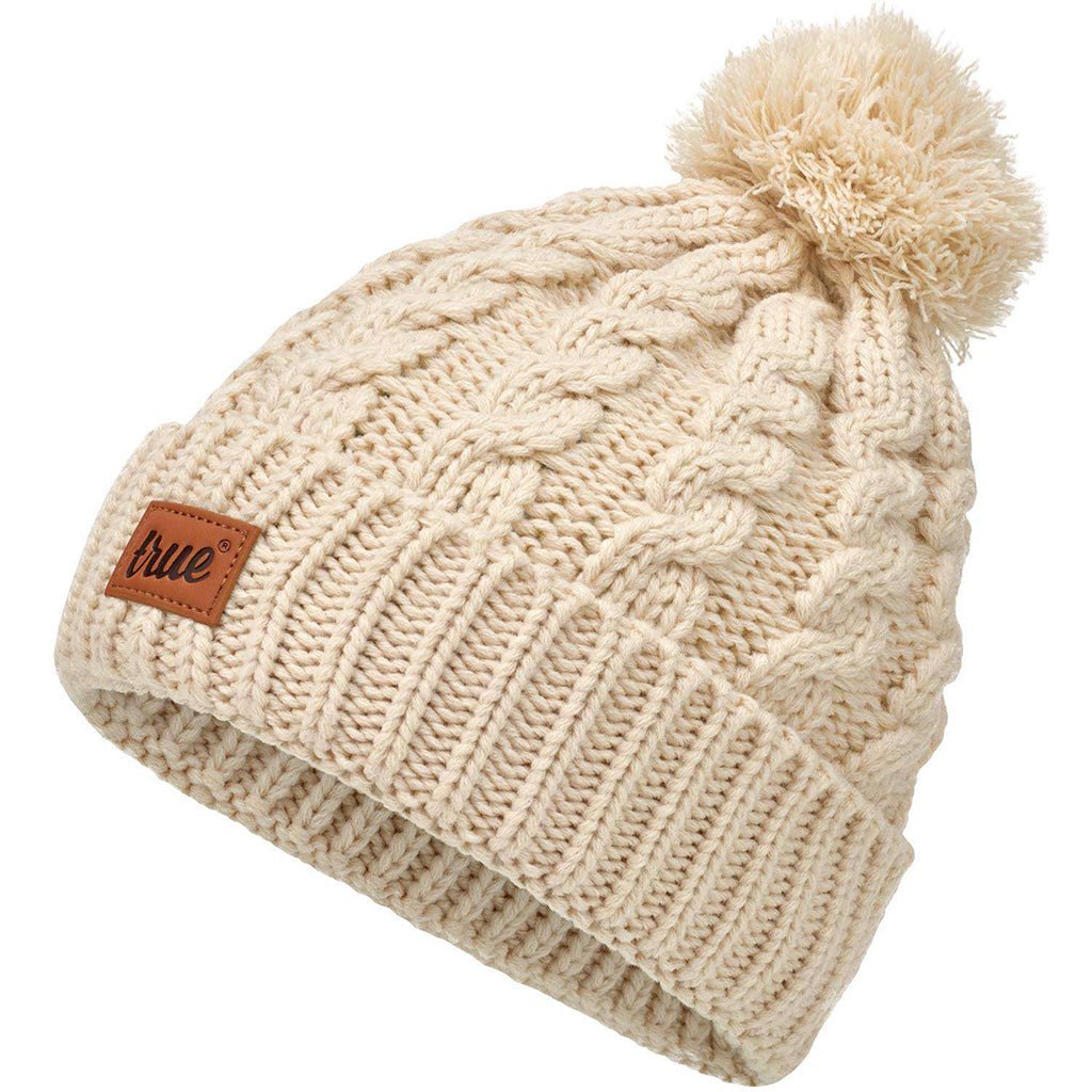 Cream bobble beanie hat with a pom-pom from truevisionbrand, featuring a cozy knitted design for cold weather wear.