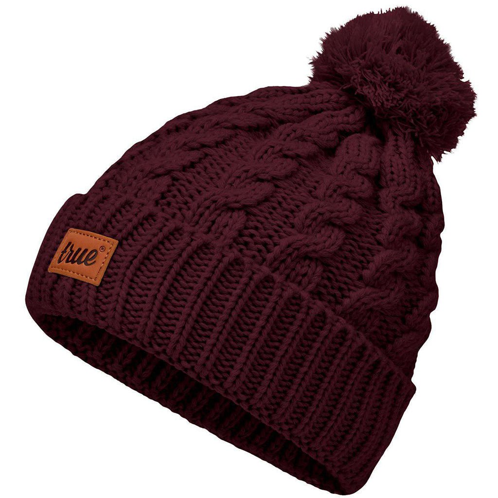 Truevisionbrand burgundy bobble beanie hat with a pom-pom, showcasing a cozy, knitted winter accessory.