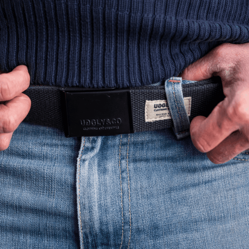 Blue canvas utility belt for men by Uggly and Co, featuring a rugged motorcycle-style design and adjustable strap.