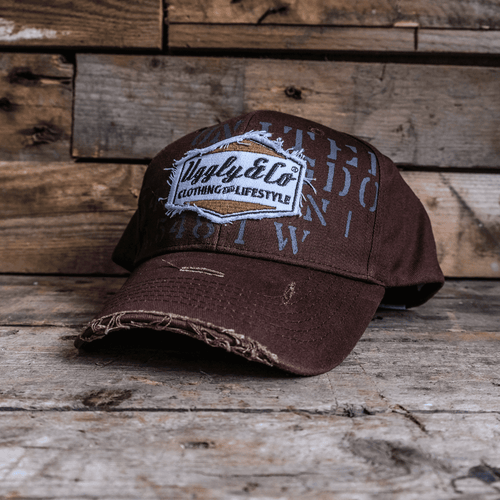 Vintage brown 'Aviation' diamond trucker cap by Uggly and Co, featuring a classic baseball cap style with embroidered aviation design.