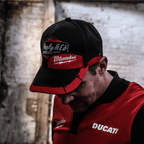 Uggly and Co Diamond Trucker Hat with Milwaukee Tools branding, featuring a classic baseball cap design and mesh back.