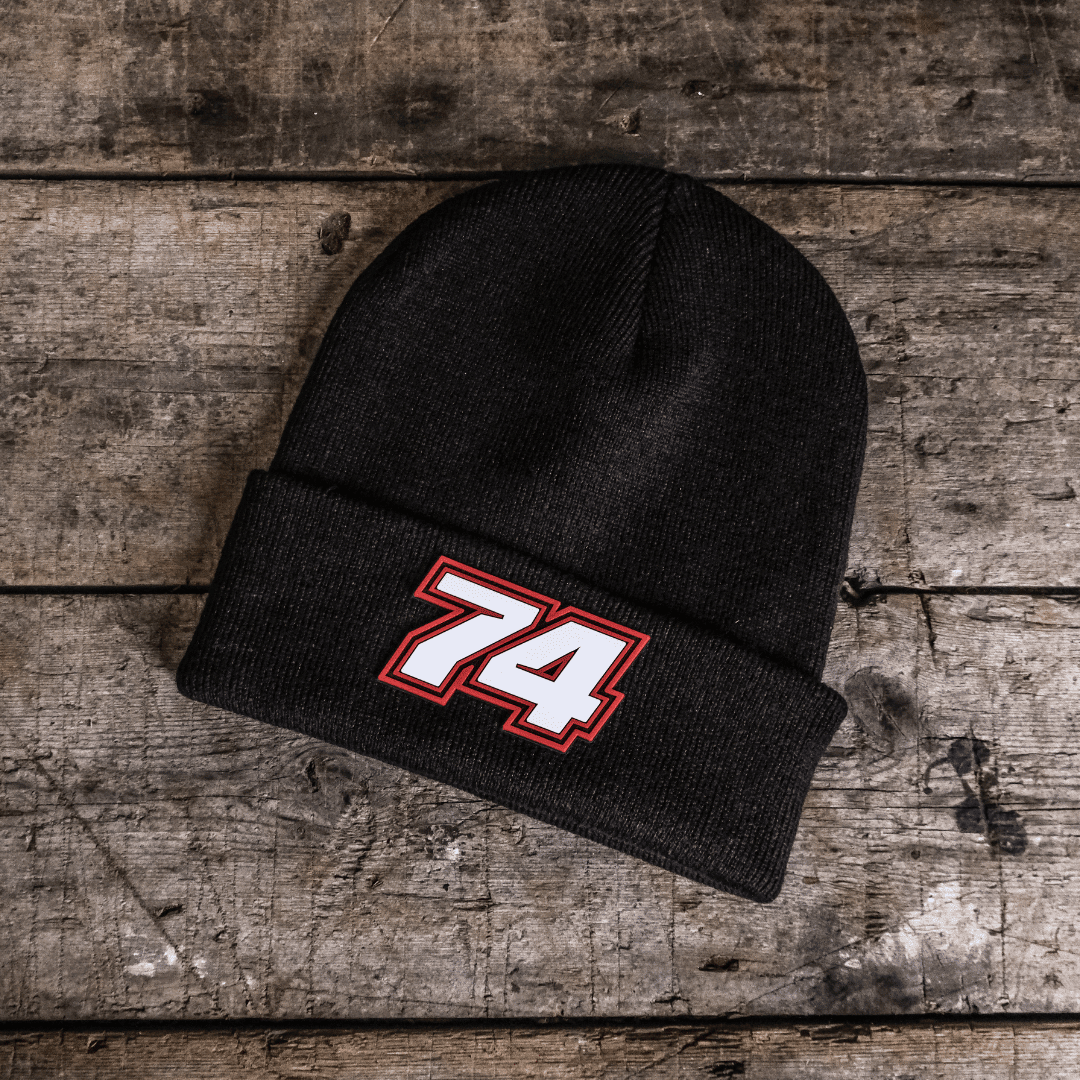 Uggly and Co Davey Todd 74 beanie featuring bold racing merchandise design, warm knit fabric, and vibrant colors.