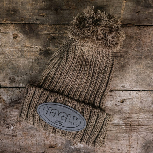 Uggly and Co Fennel Beanie in soft knit fabric with ribbed cuff and snug fit, perfect for cold weather.