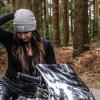 Grey Uggly and Co beanie, soft knitted fabric, snug fit, casual winter accessory displayed on a plain background.