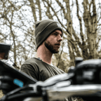 Olive Uggly and Co beanie made of soft knit fabric, featuring a snug fit and classic design for casual winter wear.