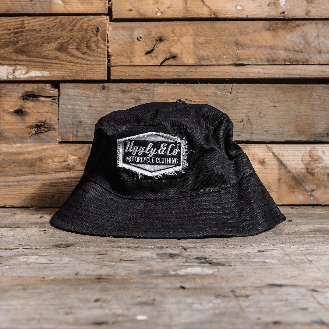 Black Diamond Bucket Hat by Uggly and Co, showing a stylish black bucket hat with a wide brim and casual design.