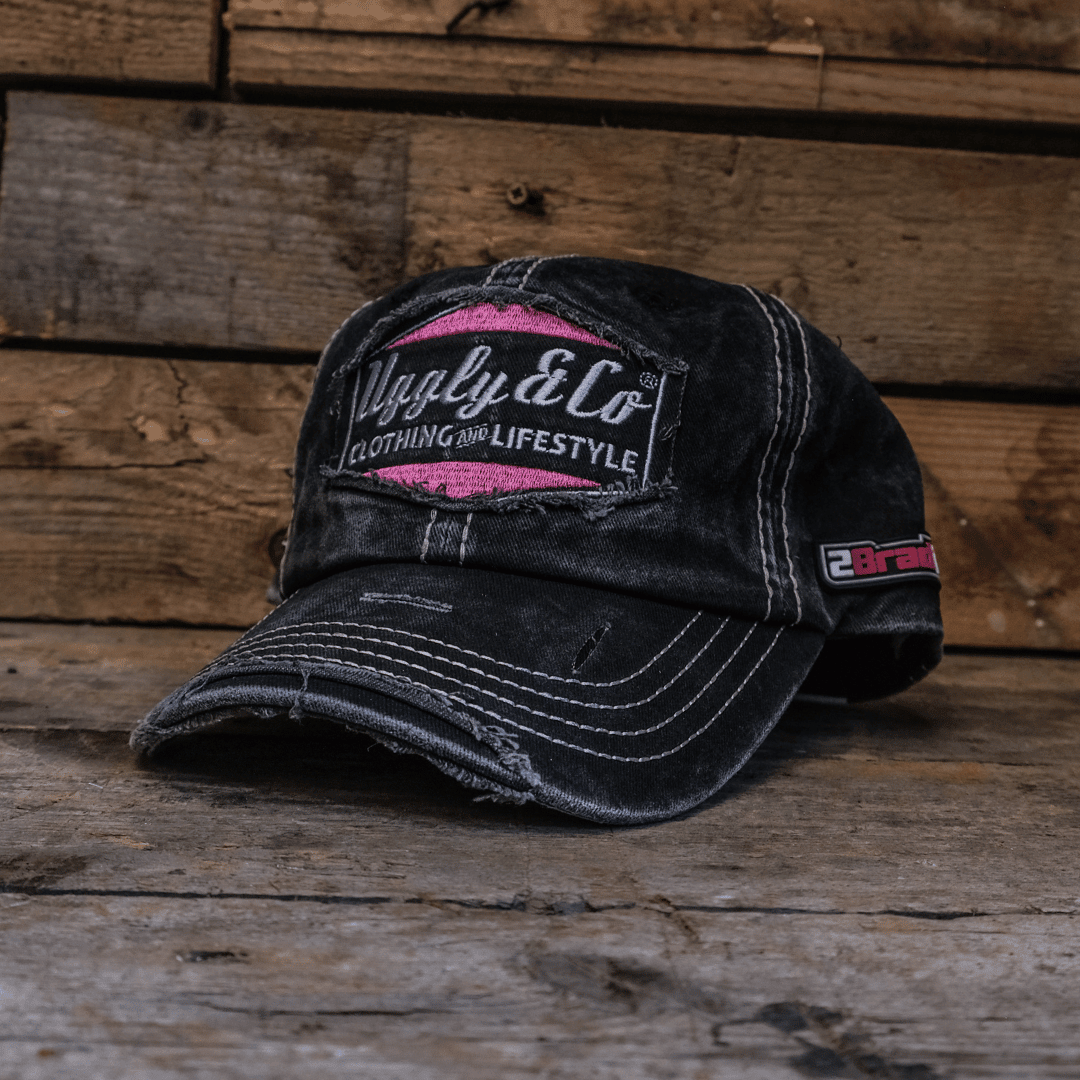Uggly and Co diamond trucker hat featuring Bradley Ray #28 logo, adjustable mesh back, and branded front panel.
