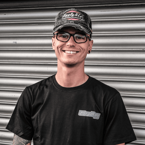 Uggly and Co Diamond Trucker Hat featuring Bradley Ray #28 logo, black mesh back and structured front in a stylish trucker cap design.