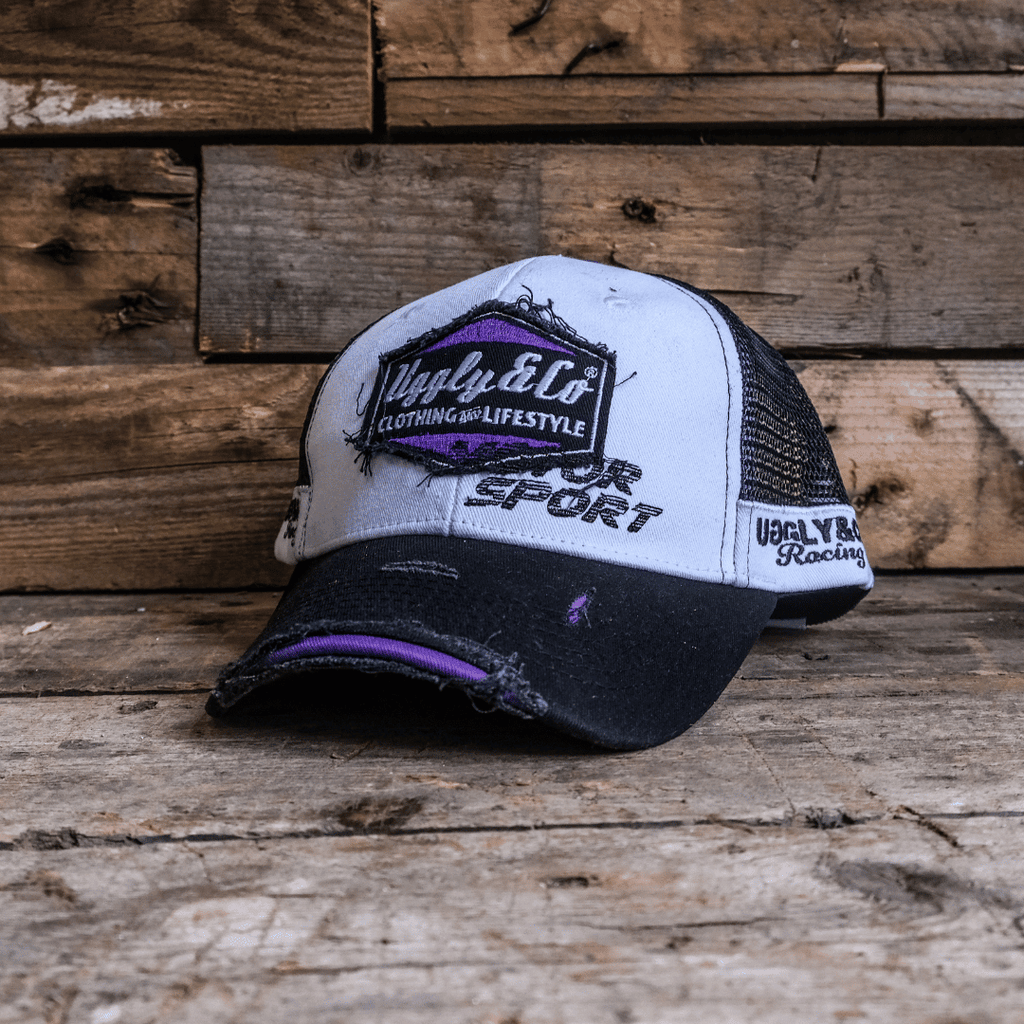 Purple diamond trucker cap by Uggly and Co featuring JDM Racing branding, with mesh back and adjustable snap closure.