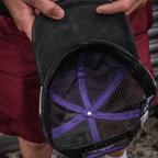 Purple diamond design trucker cap by Uggly and Co with JDM Racing branding, adjustable mesh back and curved brim.