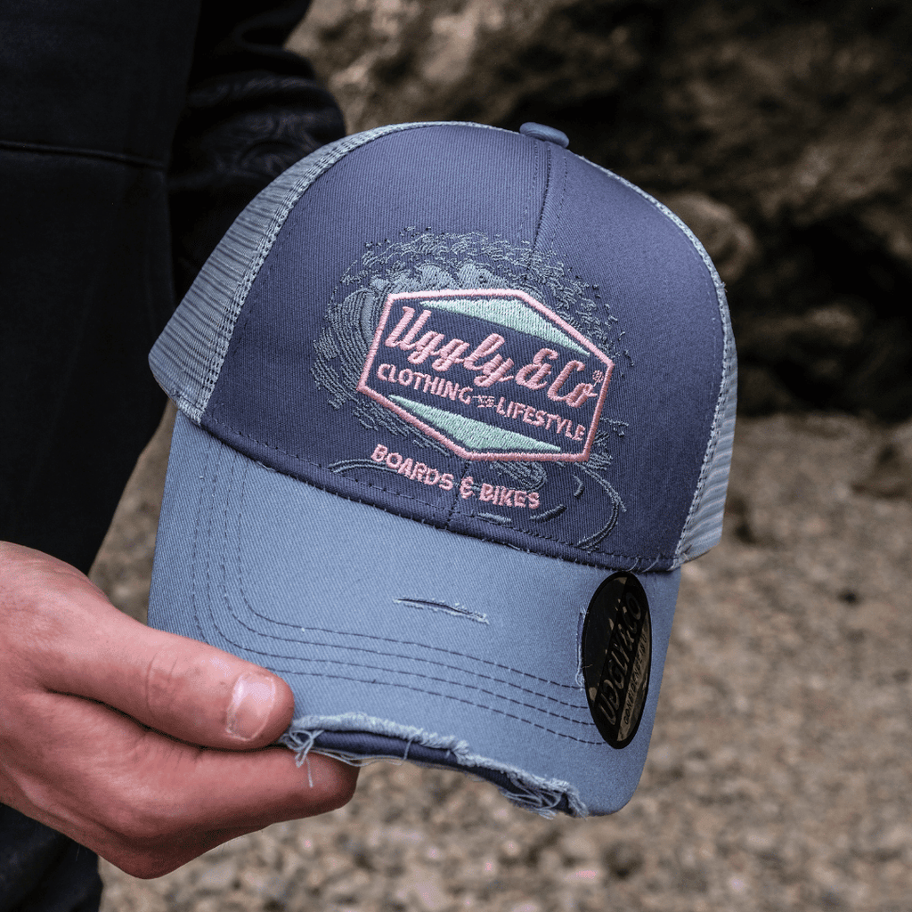 Purple Surf Diamond Trucker Hat by Uggly and Co featuring a mesh back and diamond embroidery, casual and stylish headwear.