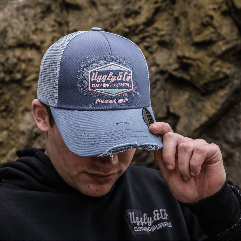 Purple Surf Diamond Trucker Hat by Uggly and Co featuring a classic trucker cap style with a diamond pattern design.