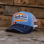 Retro blue and orange diamond trucker cap by Uggly and Co featuring mesh back and adjustable strap.