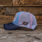 Retro blue and orange diamond trucker hat by Uggly and Co featuring a classic mesh back and adjustable snap closure.