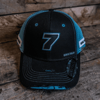 Black and blue Uggly and Co trucker cap featuring official Davey Todd merchandise, with a structured crown and curved brim.
