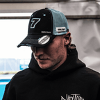 Black and blue Uggly and Co trucker cap featuring official Davey Todd merchandise logo and design.