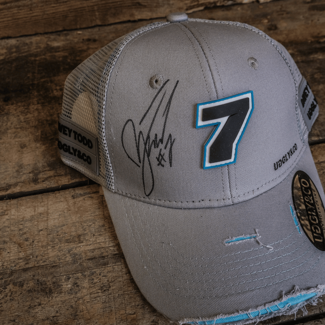 Uggly and Co steel grey signed Davey Todd merchandise trucker hat, casual headwear with signature detail.