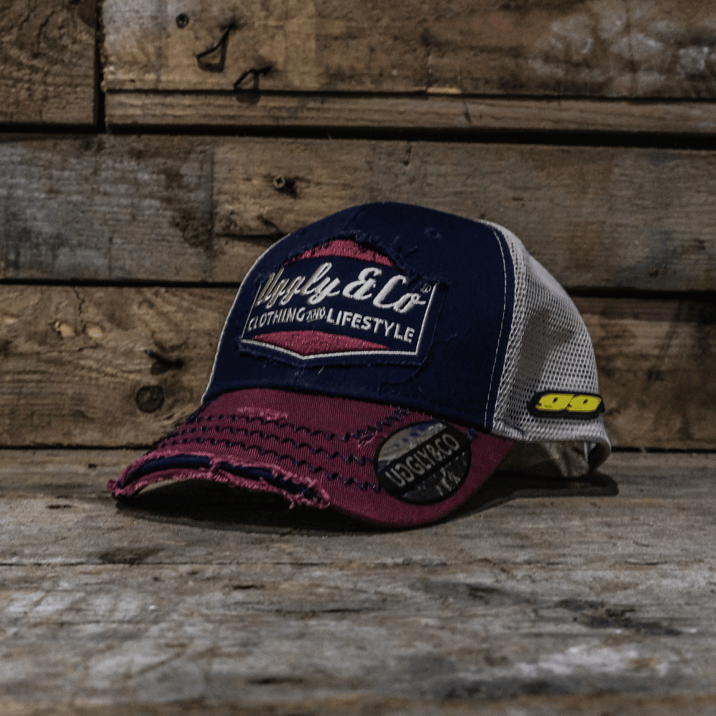Diamond Trucker Hat by Uggly and Co featuring Jeremy McWilliams #99 logo, black mesh trucker cap with diamond embroidery.