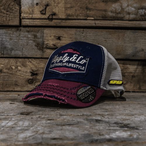 Diamond Trucker Hat by Uggly and Co featuring Jeremy McWilliams #99 logo, black mesh trucker cap with diamond embroidery.